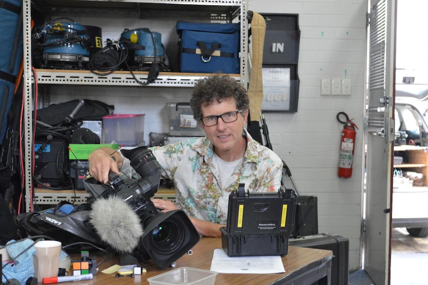 Cameraman Mark Farnell shows his recording equipment at the studios.