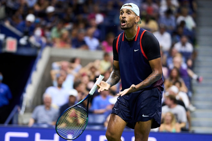 nick kyrgios yells while holding his hands in a shrugging motion