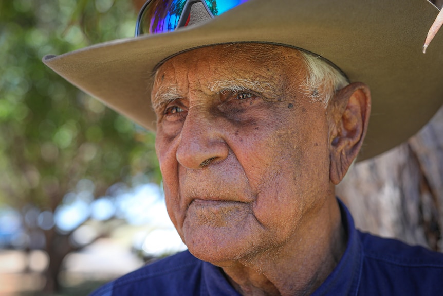 Close-up of an elderly Indigenous man wearing an Akubra.