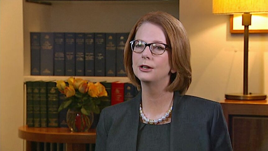Gillard defends budget deficit