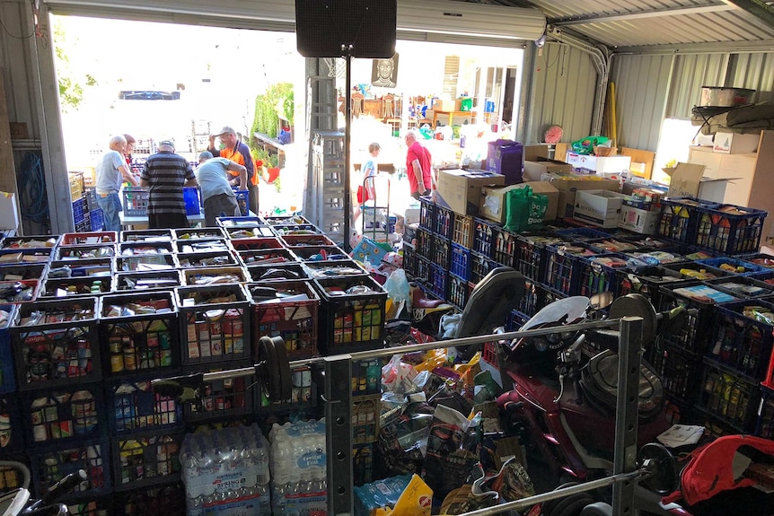 A shed filled with more than 700 milk crates of donated groceries