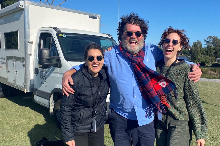 Russell Woolf having a laugh with two of his ABC colleagues.