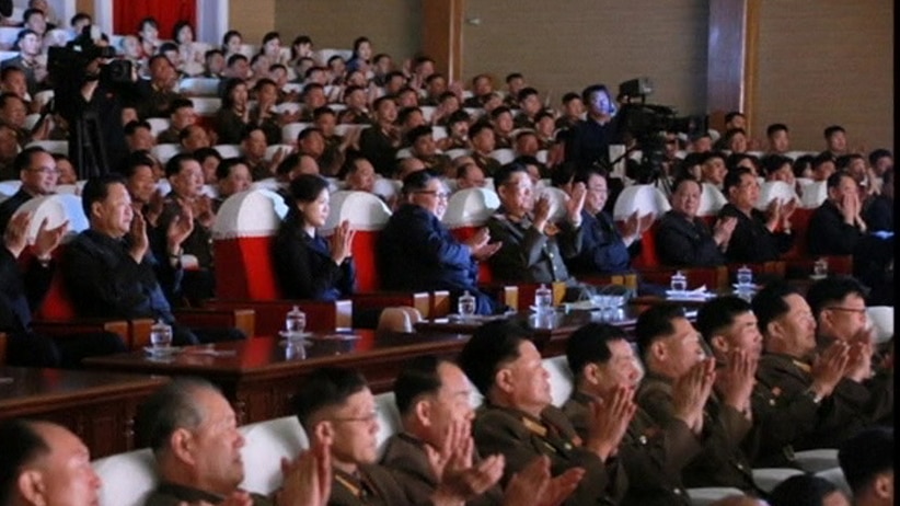 STILL PHOTOGRAPH OF NORTH KOREAN LEADER, KIM JONG UN AND NORTH KOREA'S HIGH-RANKING OFFICIALS