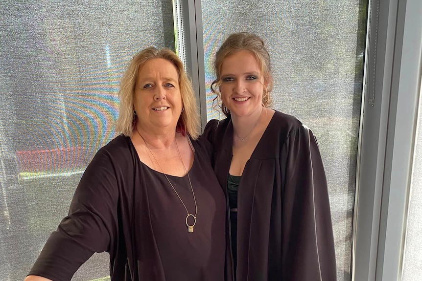 Sharon Murphy with daughter Keeley Murphy at high school graduation 