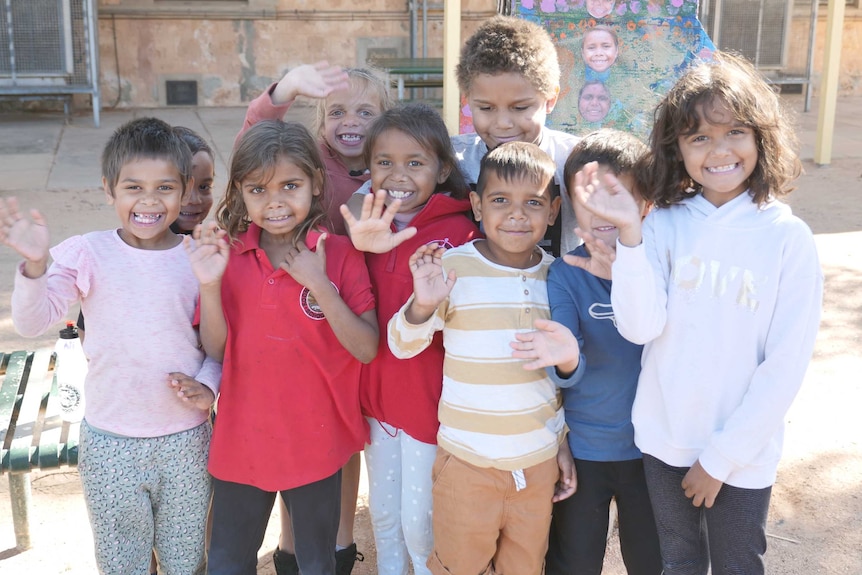 Children in front of an old school building