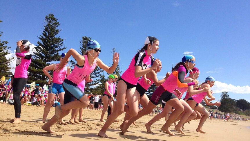 Nippers from surf lifesaving clubs around the state gather in Torquay, ahead of sweltering conditions on Friday afternoon.