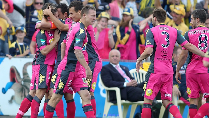 Central Coast Mariners celebrate a goal against Adelaide