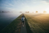 Marathon runner Mina Guli alongside the Thames river in England.