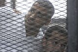 Al Jazeera journalists Mohamed Fahmy and Baher Mohamed