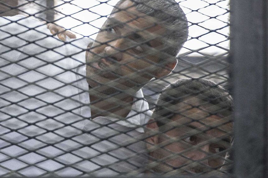 Al Jazeera journalists Mohamed Fahmy and Baher Mohamed