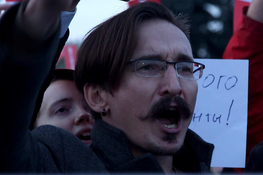 Man shouting during a protest in Saint Petersburg.