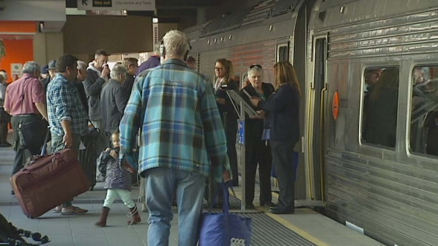 At the East Perth terminal, passengers board the Australind which is bound for Bunbury