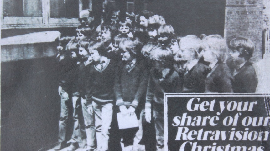 A black and white newspaper clipping of a group of school boys in 1976.