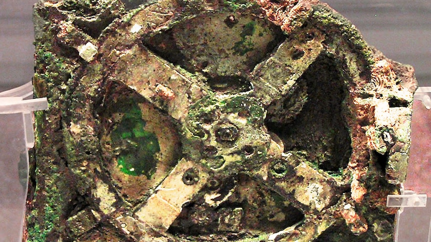 Fragment of the Antikythera mechanism in a museum