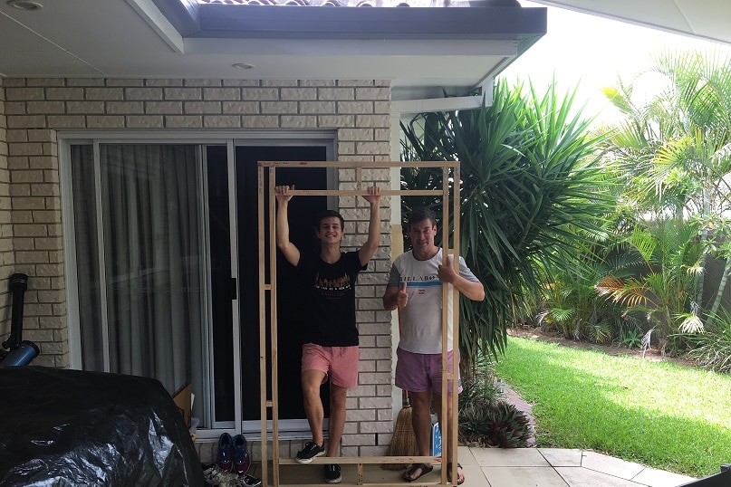 Scott and his dad building a hologram frame at their Bayside home.