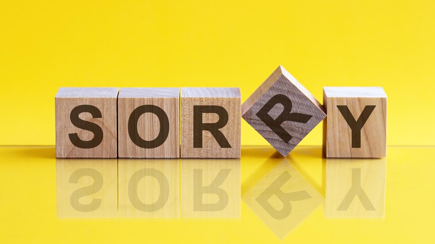 Blocks spelling the word sorry