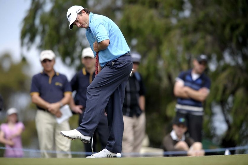 South Africa's Tim Clark reacts to a putt