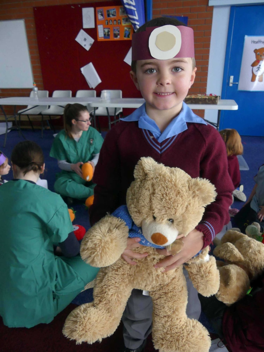 Ryley Minehan with teddy