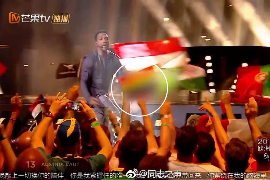 Screen capture of China's censored Eurovision broadcast. A rainbow flag has been blurred.