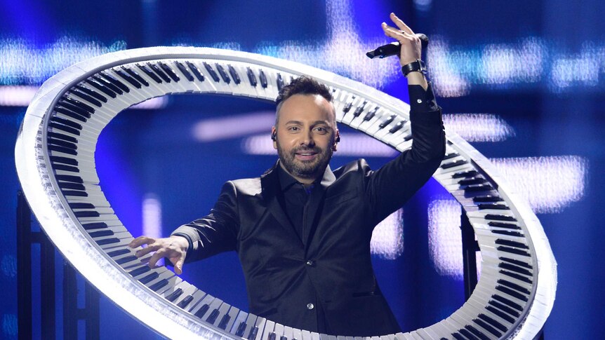 Romanian contestant Ovi performs at Eurovision 2014