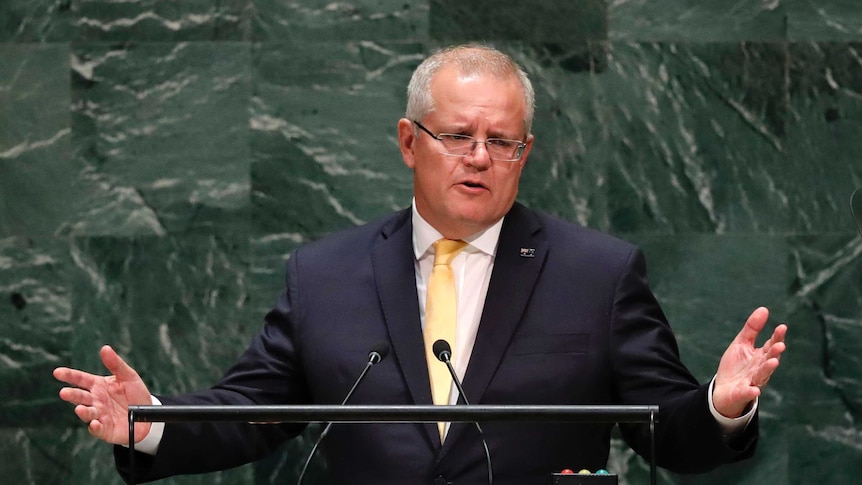 Scott Morrison spreads his arms as he speaks to the United Nations General Assembly in New York