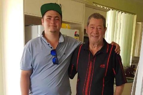 Austin Smith (left) standing next to his grandfather Stanley Broadwood