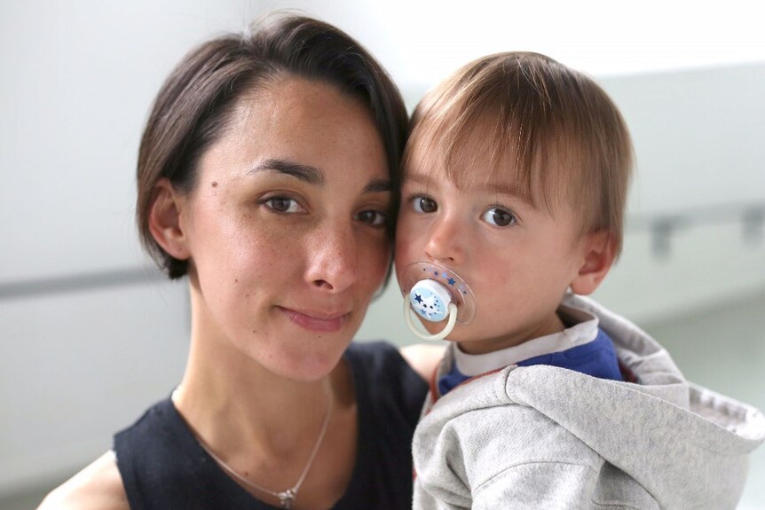 Casual worker Claire Hill with her 18-month-old  son Theo