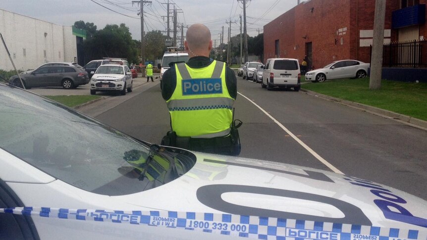 Police at the scene at Doveton in south-east Melbourne where a woman's body was found.