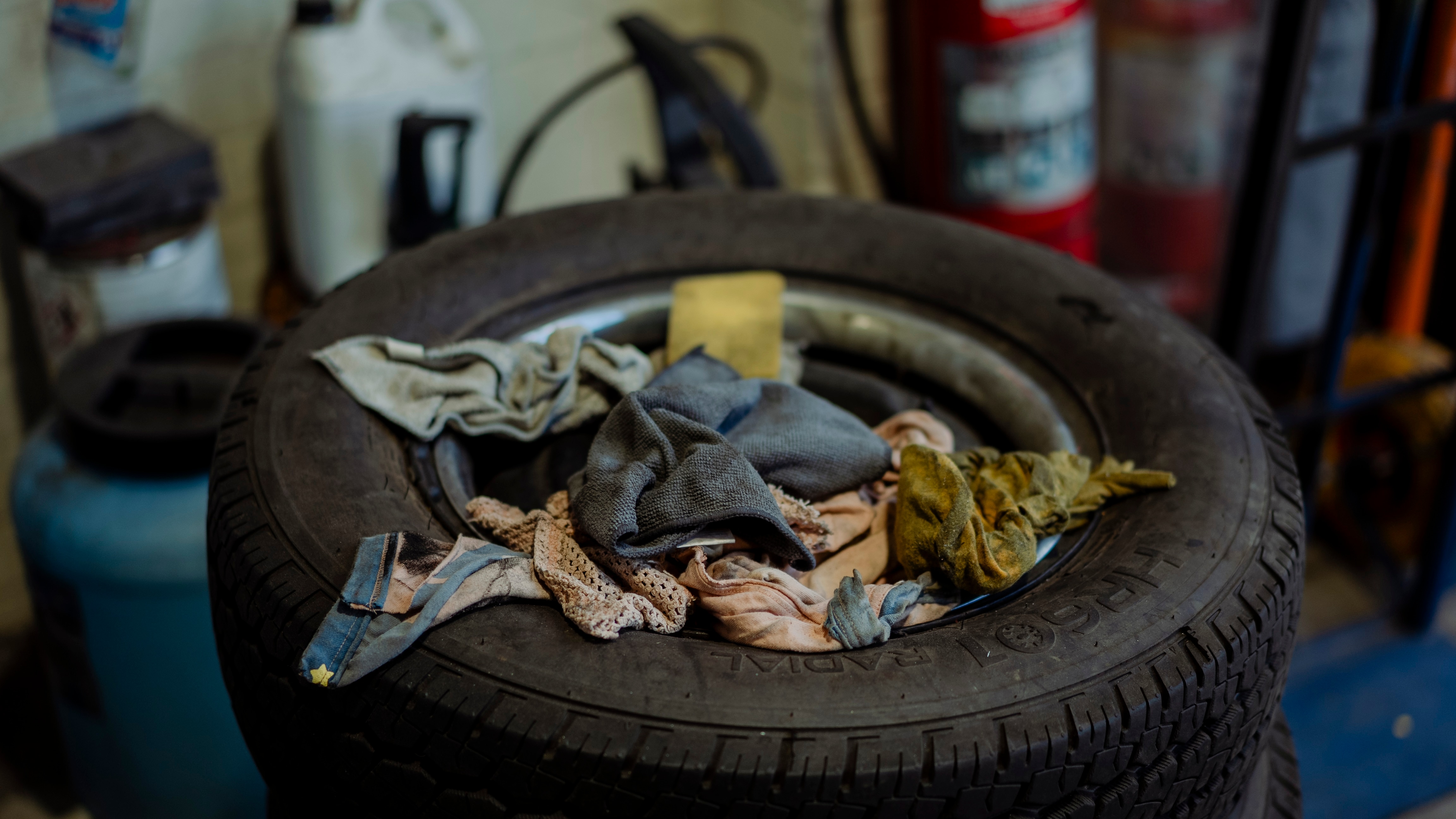 Old cloths inside a tyre.