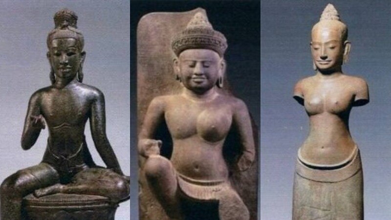 Three stone Angkorian-style statues.