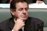 Liberal backbencher Peter Slipper listens during question time
