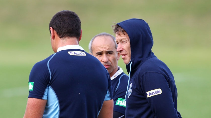Determined to go...Blues coach Craig Bellamy (r) couldn't make Tahu stick around for a mediation with Johns.