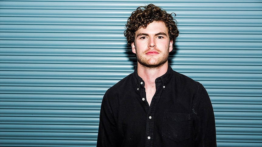 A 2016 press shot of Vance Joy