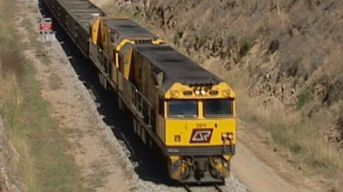 QR coal train moving along track in central Queensland (ABC News, file image)