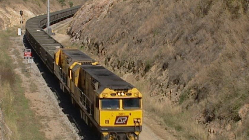 TV still of  Qld Rail coal train moving along track in central Qld on August 8, 2008.