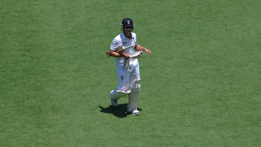 Jonathan Trotts off the field after dismissal