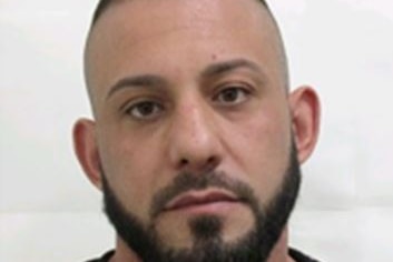 A close-up photograph of Ricardo Barbaro, a man with short dark hair and a neat beard.