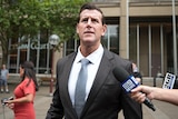 Ben Roberts-Smith in a suit and tie