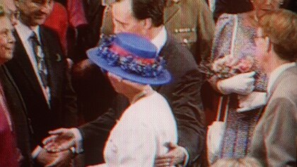 Paul Keating touches Queen Elizabeth on the back