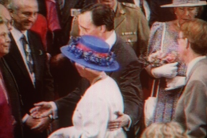 Paul Keating touches Queen Elizabeth on the back