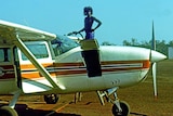 Yingiya Guyula refuels a plane.