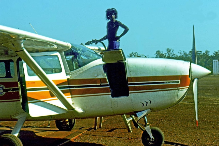 Yingiya Guyula refuels a plane.