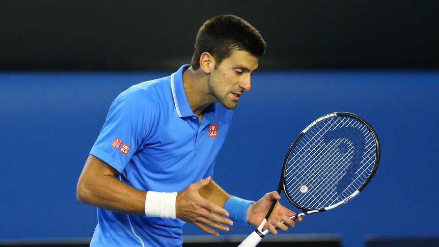 Five-set victor ... Novak Djokovic reacts to a point in his semi-final against Stan Wawrinka