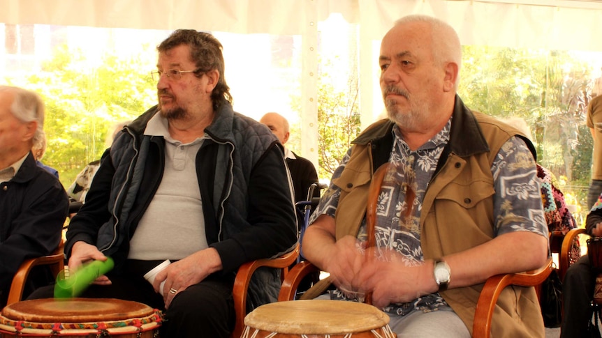 From left Dennis Cowen and Ernst Martens taking part in the African drumming.