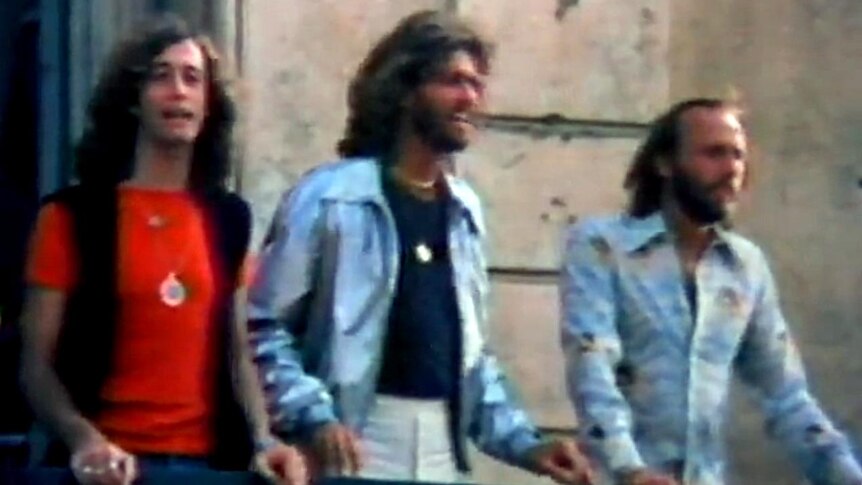 LtoR Robin, Barry and Maurice Gibb performing in the Stayin' Alive video.