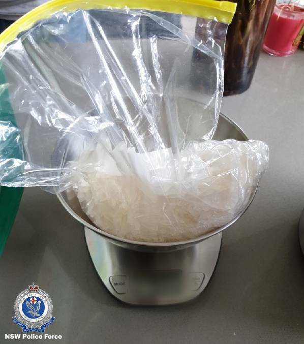 The drug ice in a silver bucket.