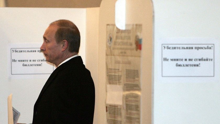 Russian President Vladimir Putin votes