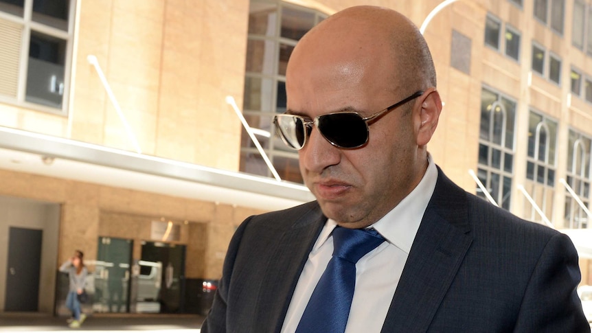 Paul Obeid leaves the ICAC hearings in Sydney on November 14, 2013.