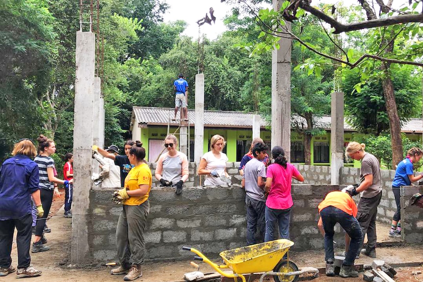 High school students help to build a school in Sri Lanka