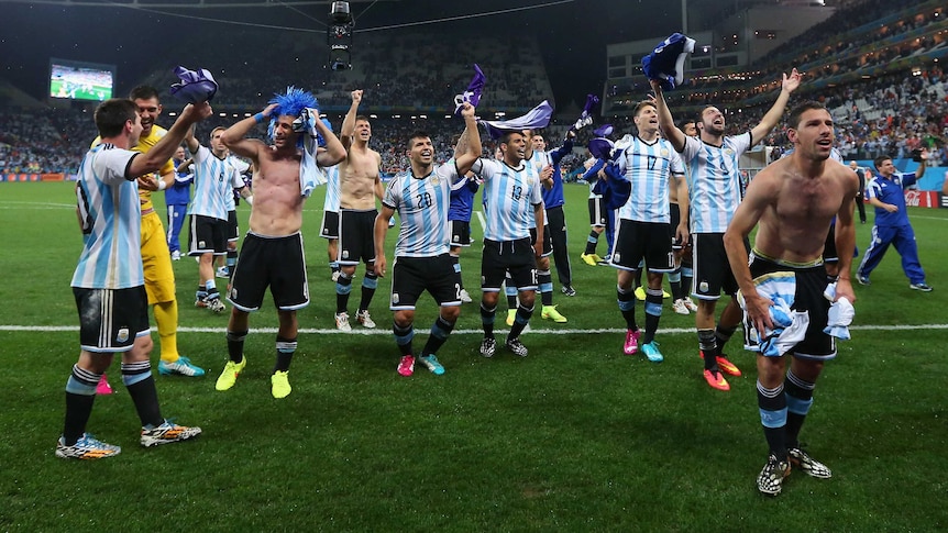 Argentina players celebrate shoot-out win over Netherlands